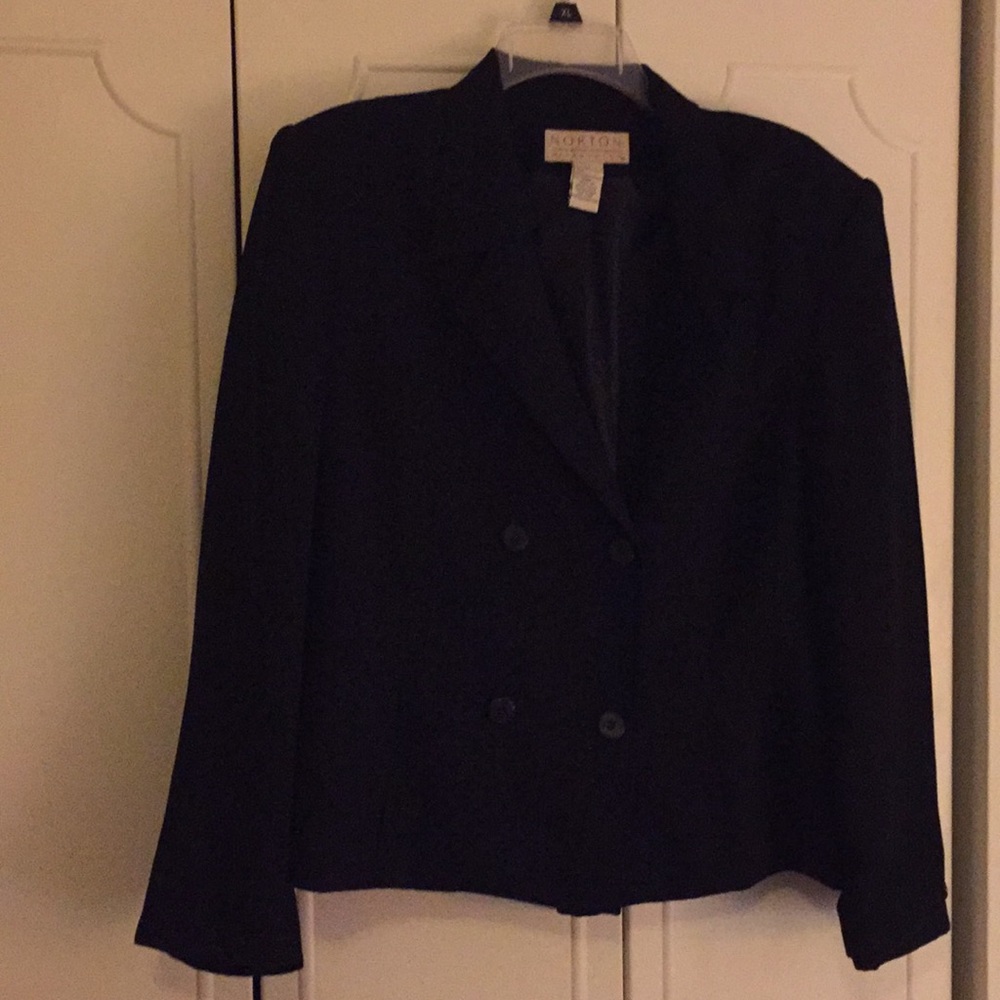 Women’s Black polyester blazer.  Size 14.